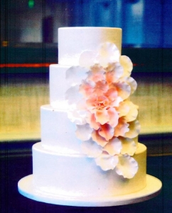 Coral and Ivory Cascading Flower Wedding Cake