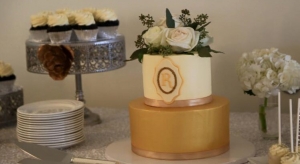 Gold Monogram Wedding Cake with Desserts Display