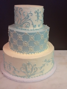 Mixed Pattern Ivory and Blue Wedding Cake