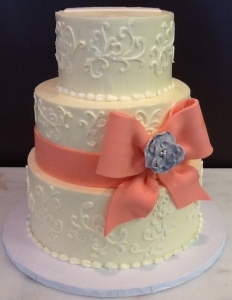 Scroll & Coral Bow Wedding Cake
